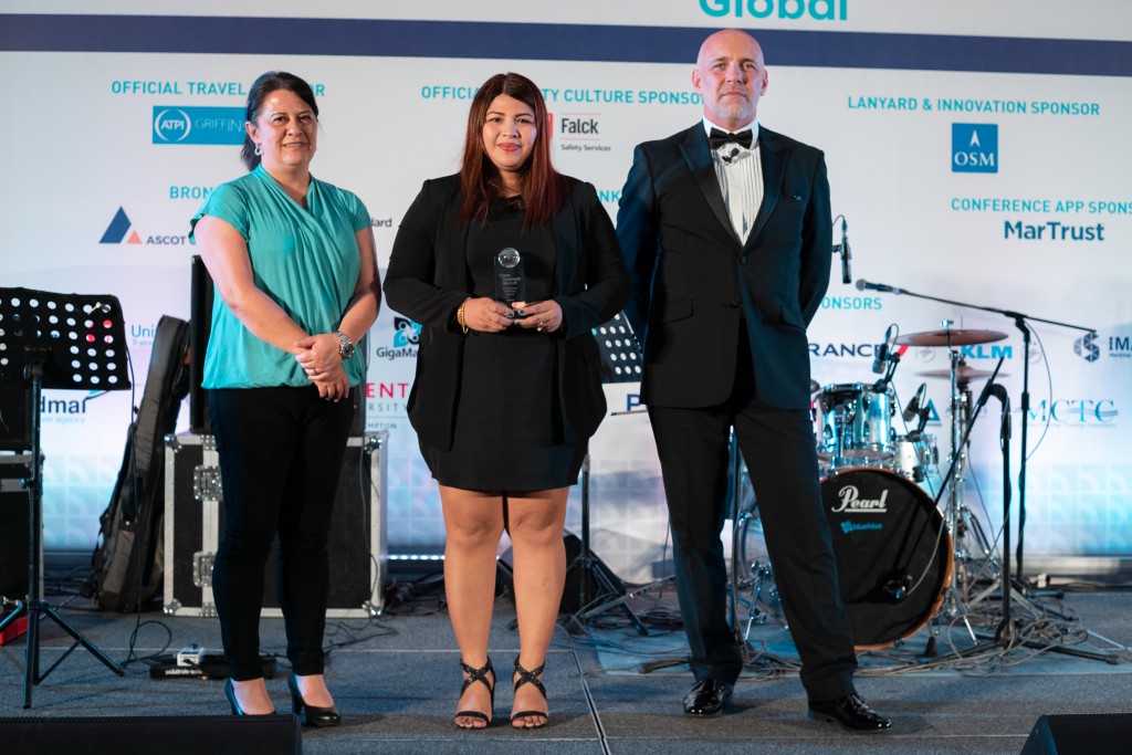 Nina Sue M De Silva receives Young Person of the Year Award from Jacqueline Smith, International Transport Workers' Federation, & Mike Powell, Cardinal Point Maritime